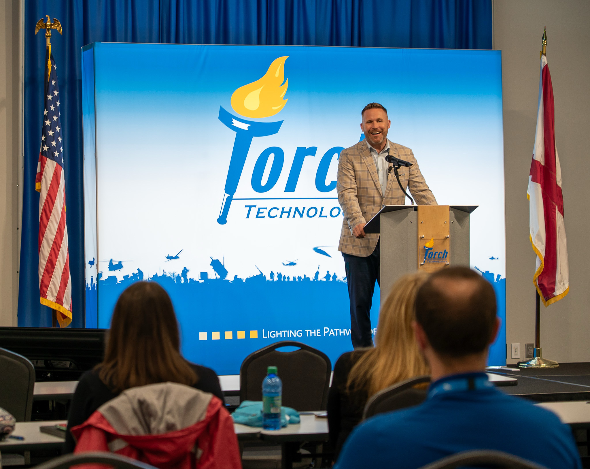 Jason Parks speaking at a corporate business event