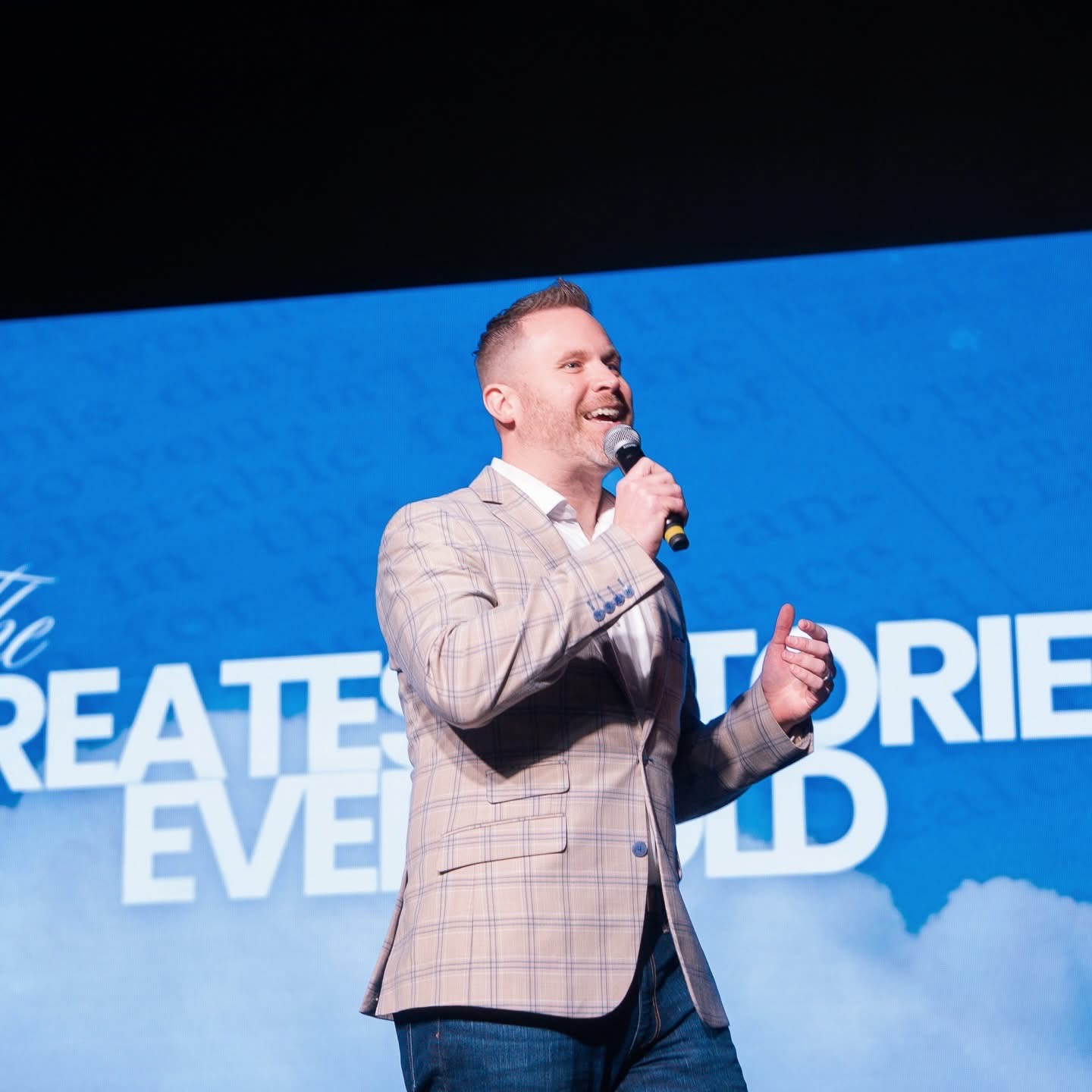 Jason Parks delivering a keynote on stage
